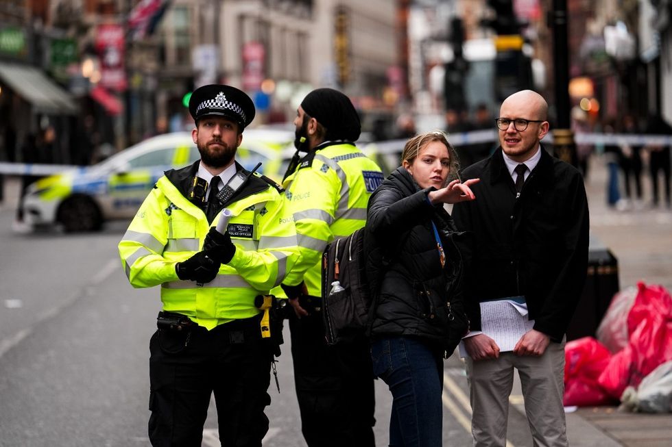 Police outside the cordon at u200bShaftesbury Avenue