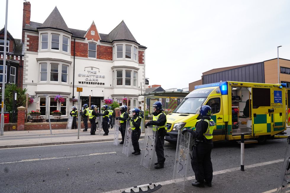 Police outside The Swatters Carr following a disturbance at the pub during an anti-immigration protest in Middlesbrough