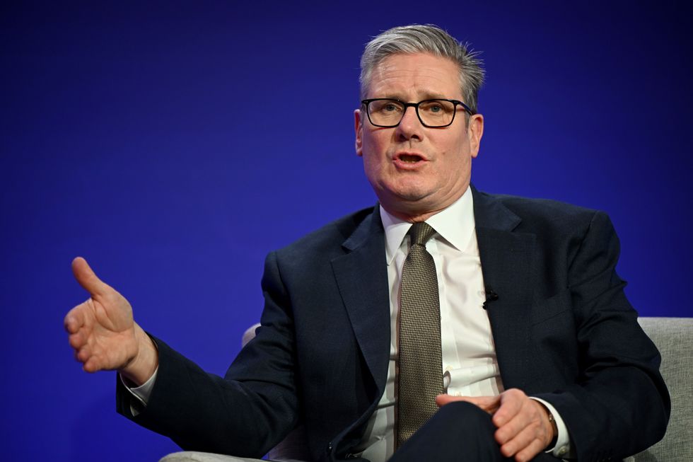 Prime Minister Keir Starmer gestures as he speaks during the JEF Leaders Summit in Tallinn