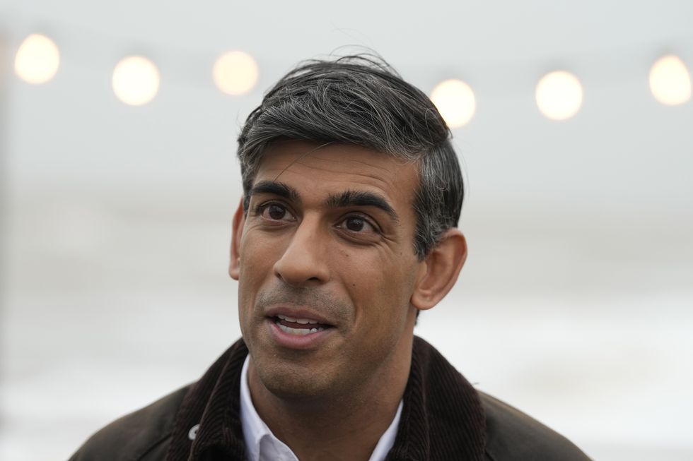 Prime Minister Rishi Sunak speaks to members of the public during a visit to Clacton-on-Sea