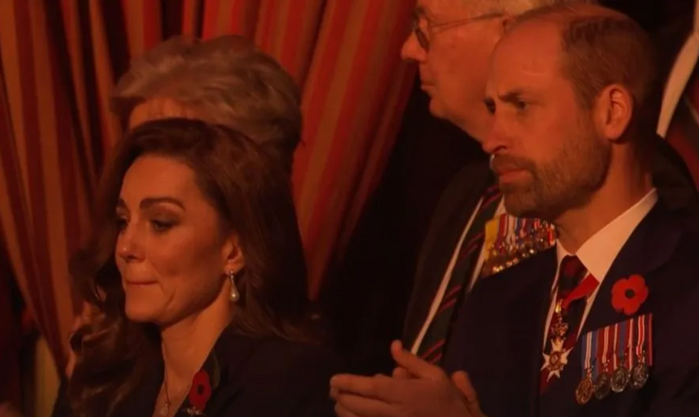 Prince and Princess of Wales looking emotional