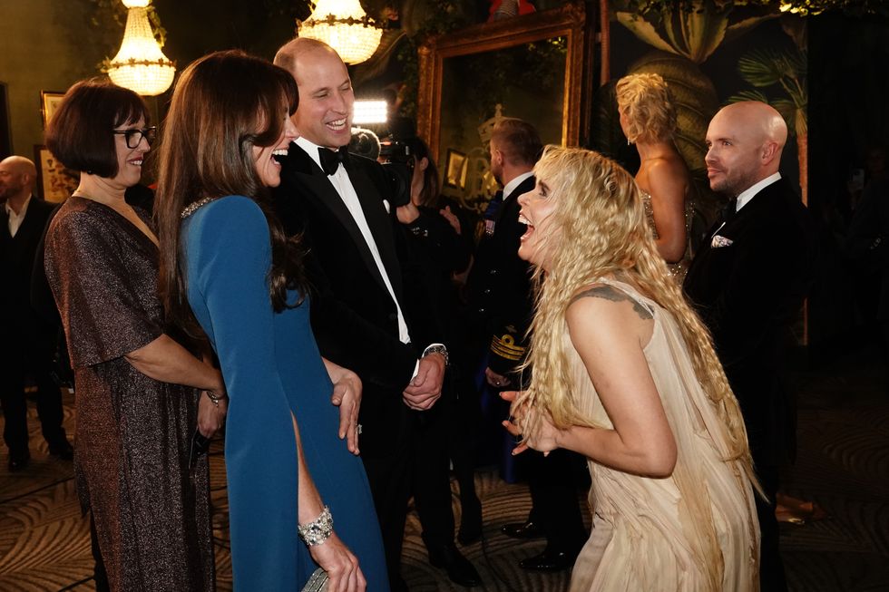 Prince William and Kate Middleton look overjoyed to receive standing ...