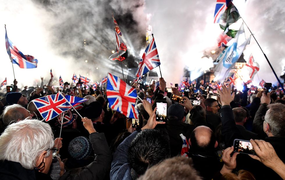 Pro Brexit supporters celebrate as the United Kingdom exits the EU during the Brexit Day Celebration Party hosted by Leave Means Leave at Parliament Square