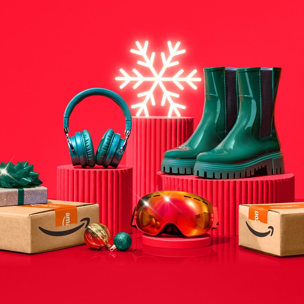 products arranged around a christmas tree with amazon boxes on display