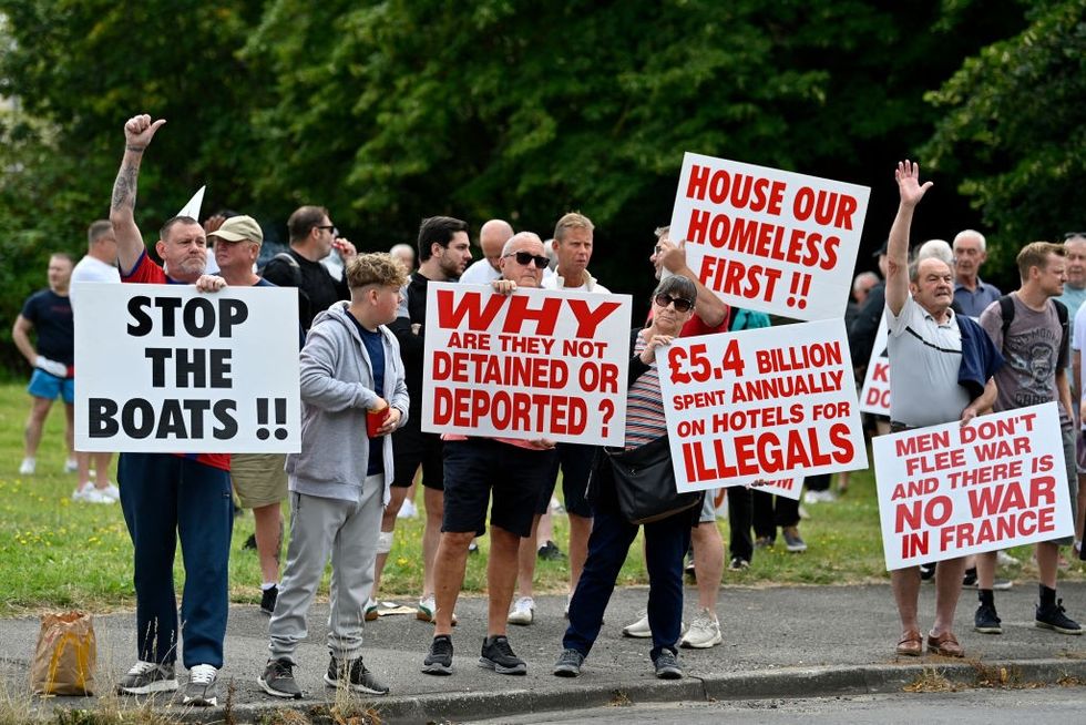 Protest against migration outside migrant hotel