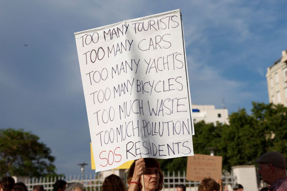 Protester holding a sign in Palma