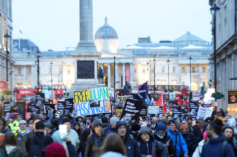 Protesters cheering to free Julian Assange