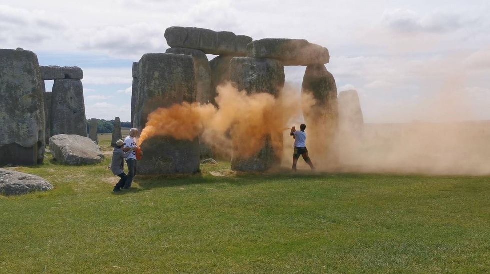 Protesters defacing Stonehenge