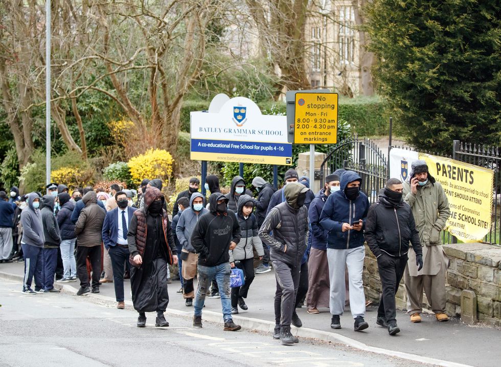 Protesters gathered outside Batley Grammar School