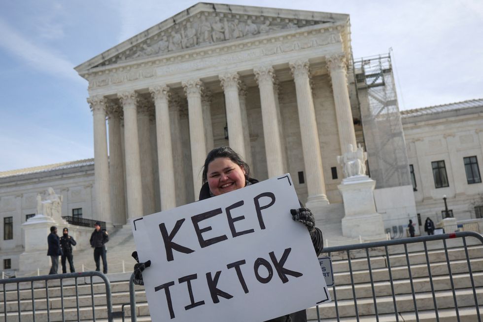 protestors with keep tiktok sign outside of the us capitol building