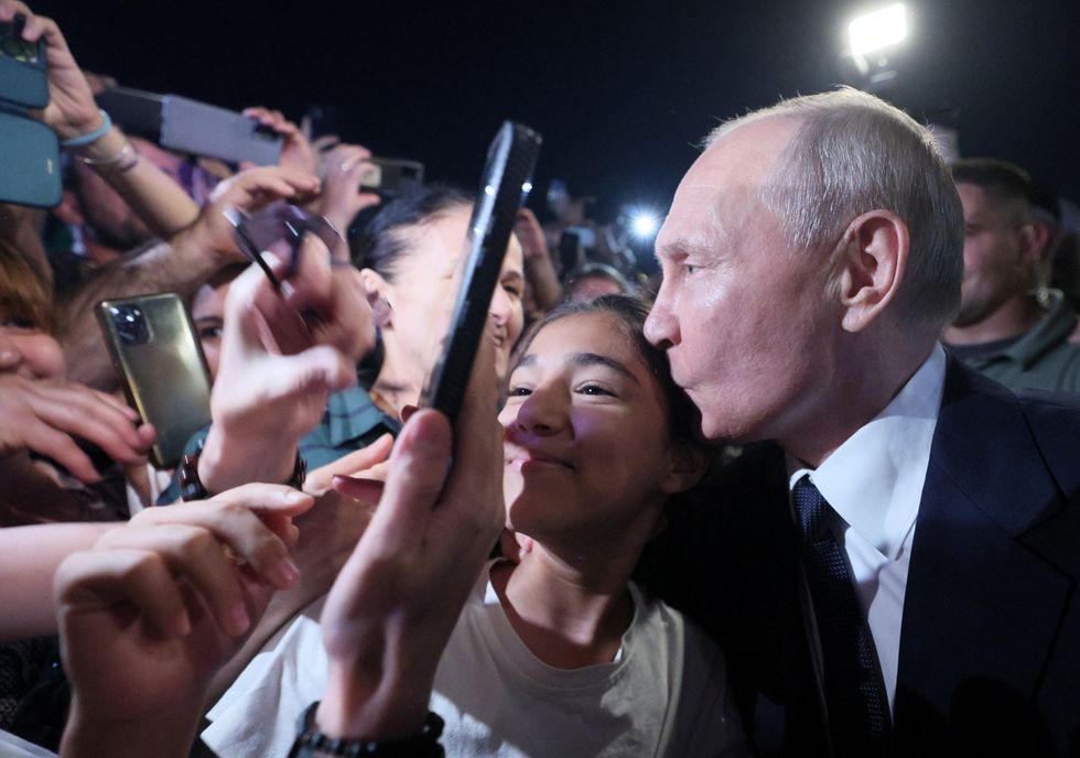 Putin visits Dagestan and is surprisingly comfortable unafraid to get up close and personal with the public