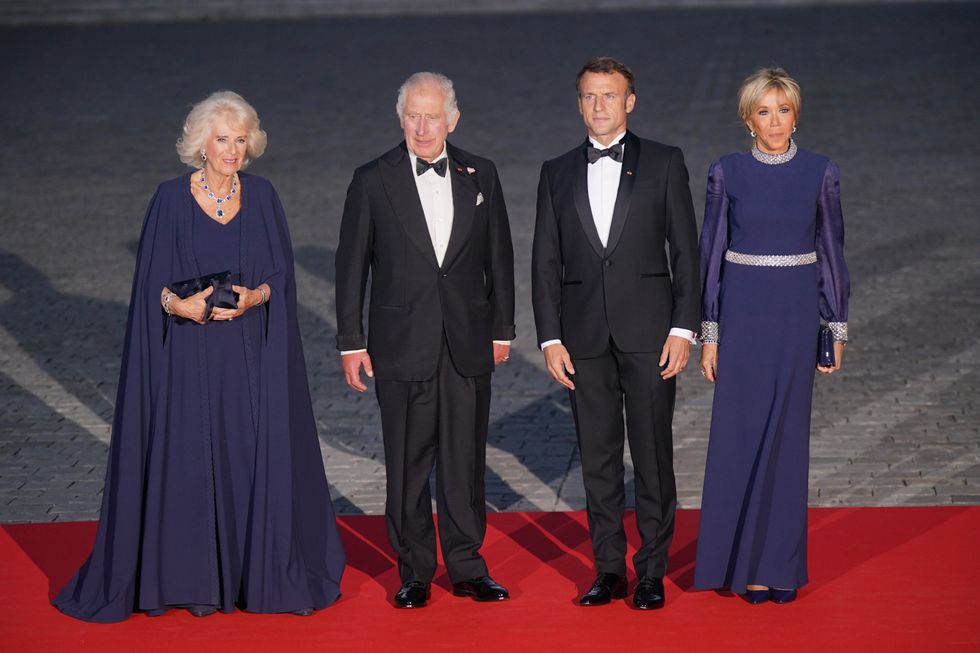 Queen Camilla, King Charles III, French President Emmanuel Macron and Brigitte Macron attending the State Banquet at the Palace of Versailles, Paris