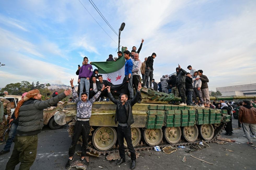 Rebels celebrating in Damascus, Syria