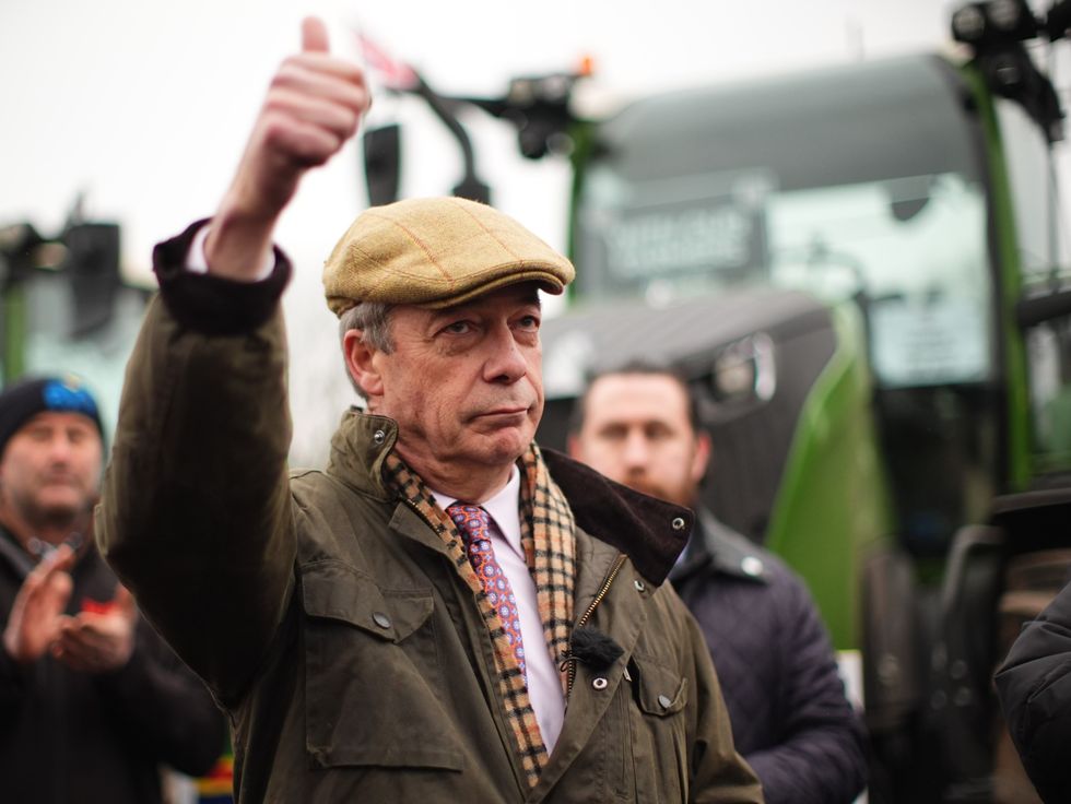 Reform UK leader Nigel Farage joins farmers and their tractors at Belmont Farm in north London