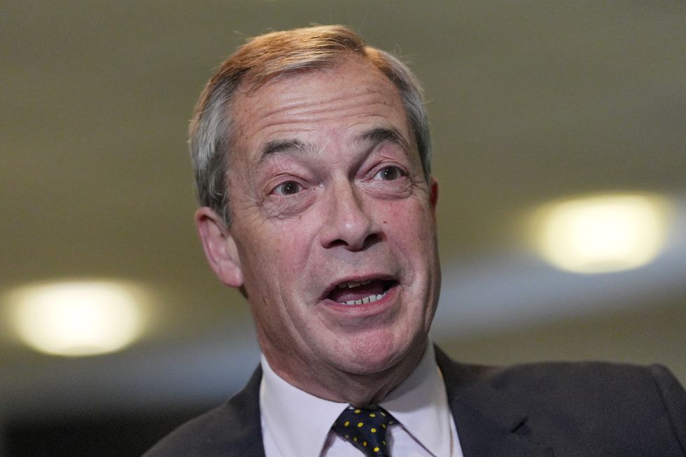 Reform UK leader Nigel Farage speaks to media during the Reform UK South East conference, at Sandown Park Racecourse in Esher, Surrey