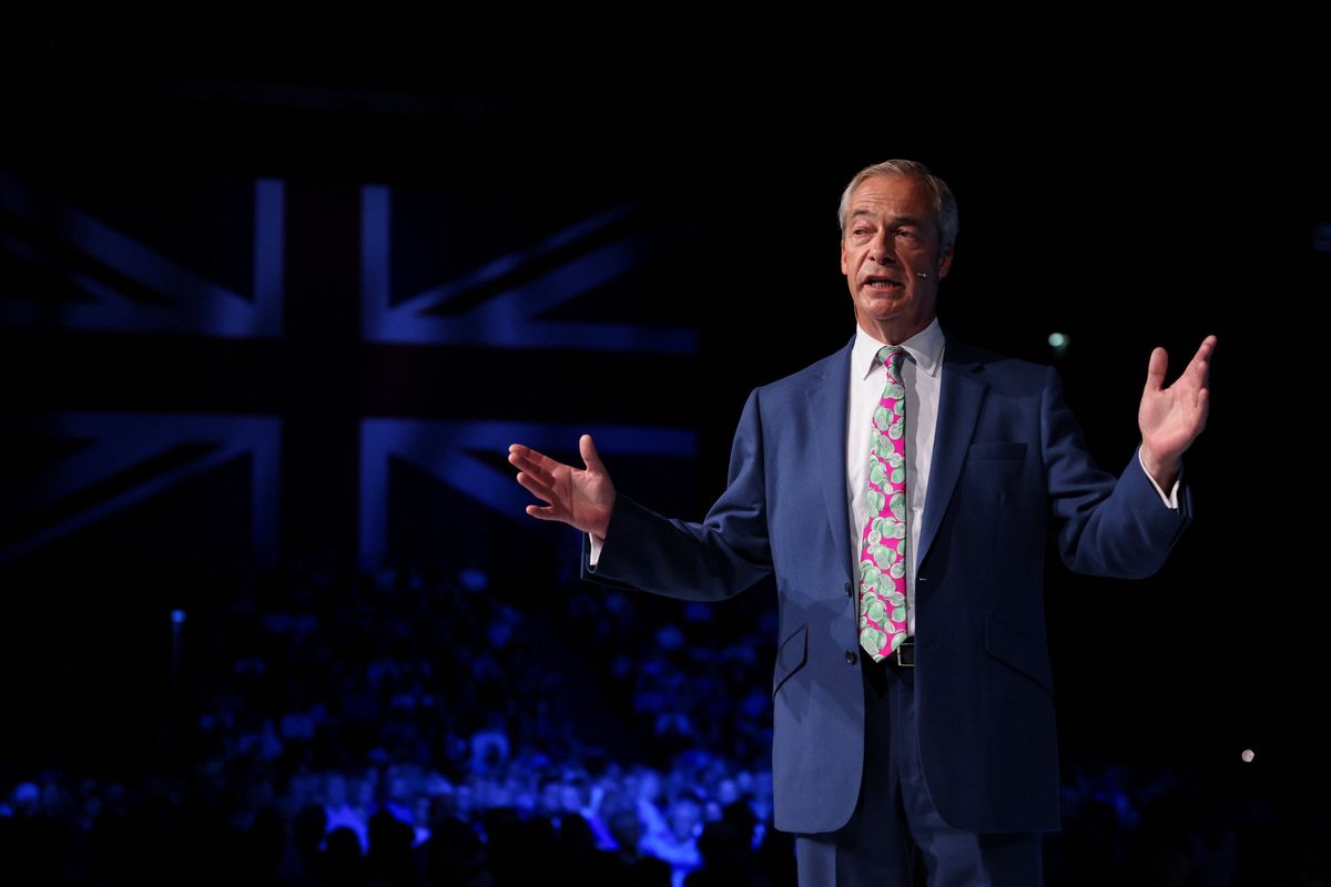 Reform UK Party Leader Nigel Farage delivers a speech during a rally at the NEC in Birmingham