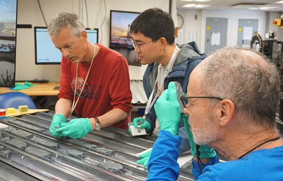 Researchers analysing the rock samples