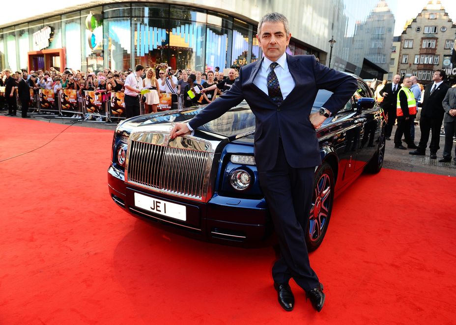 Rowan Atkinson with a Rolls-Royce