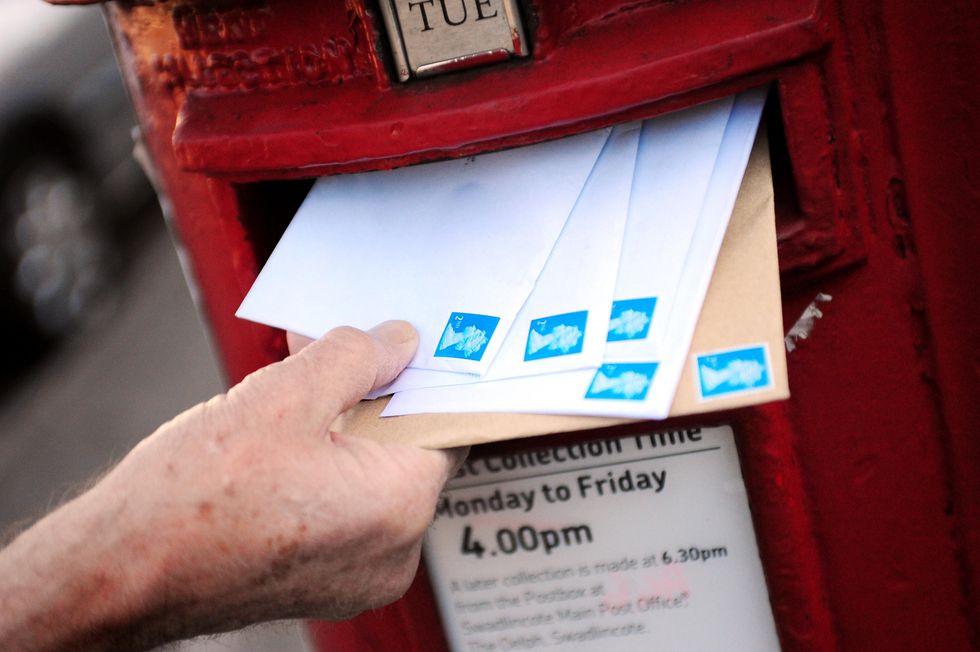 Royal Mail post box and letters