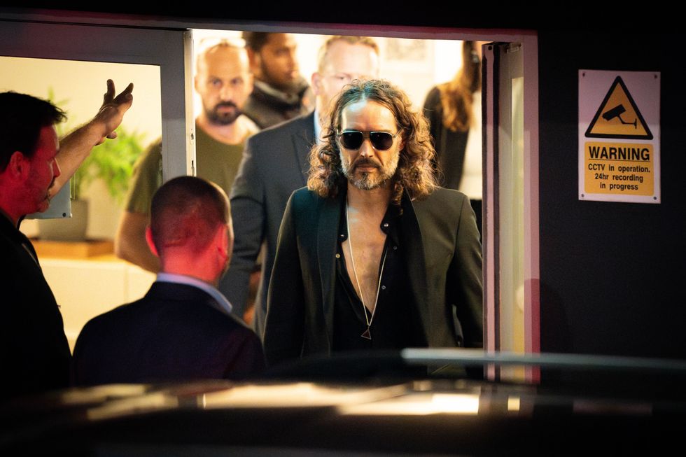 Russell Brand leaves his comedy show in Wembley, West London