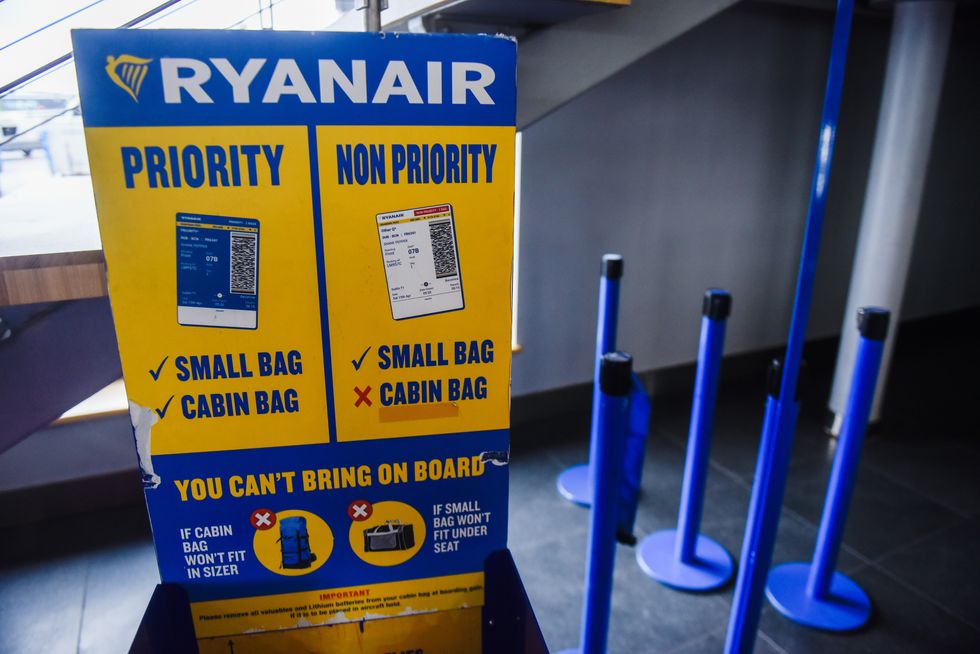 Ryanair cabin luggage policy banner seen at Riga International airport