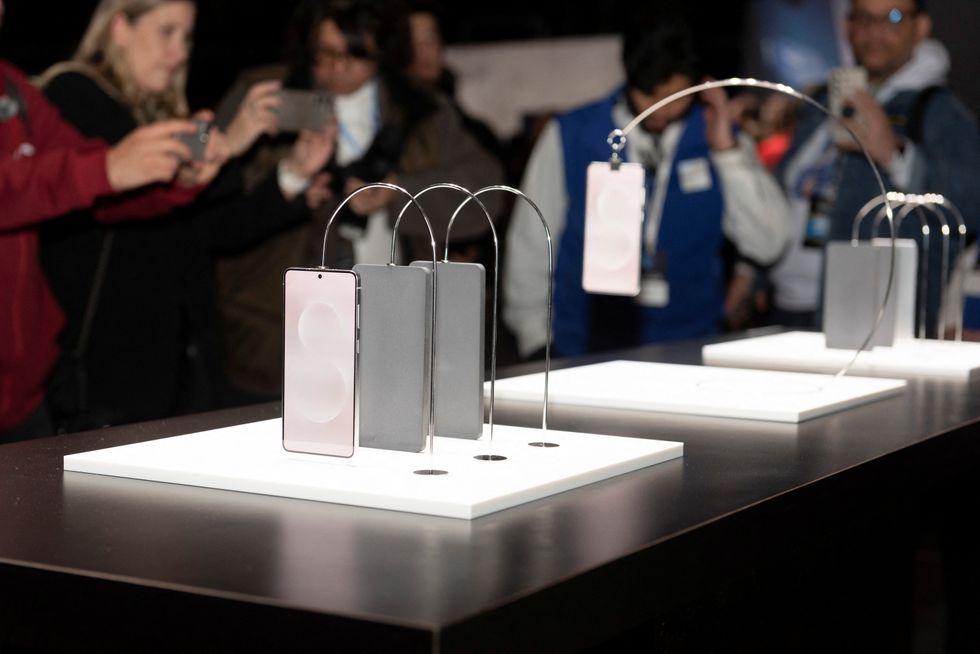 samsung galaxy s25 edge pictured hanging from a display at the unpacked event in san jose, california