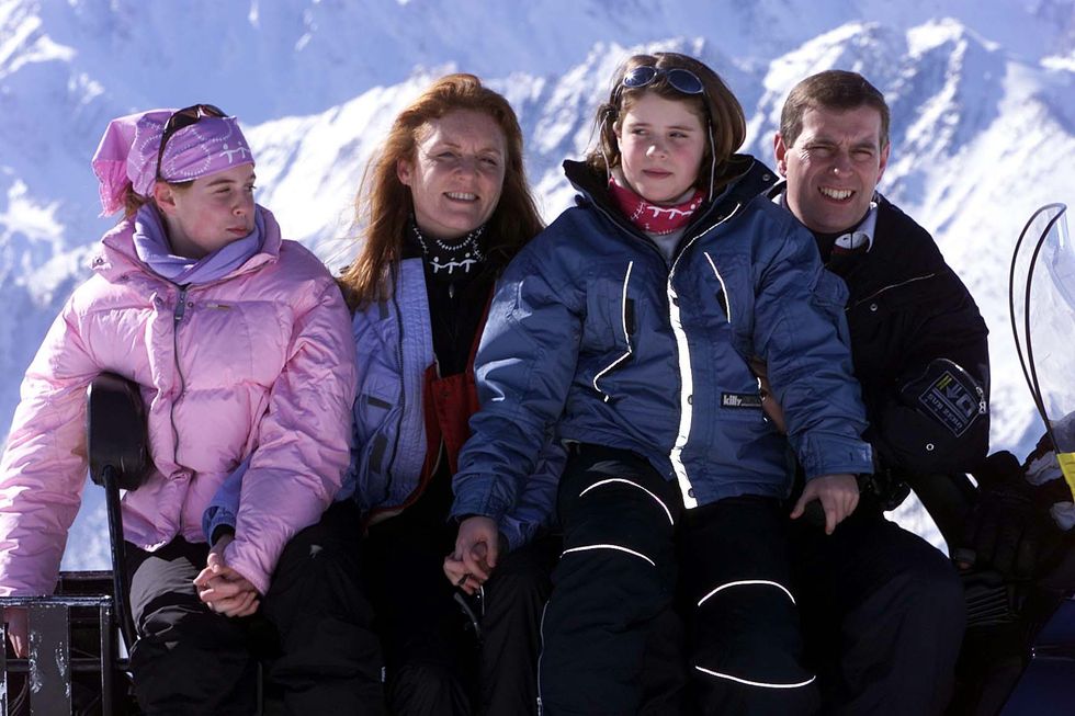 Sarah and Andrew with their daughters Princess Beatrice (left) and Princess Eugenie (2nd right) during a skiing holiday in the Swiss Alpsu200b