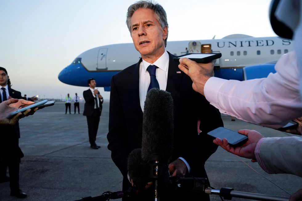 Secretary of State Antony Blinken speaks to members of the media before leaving Cairo