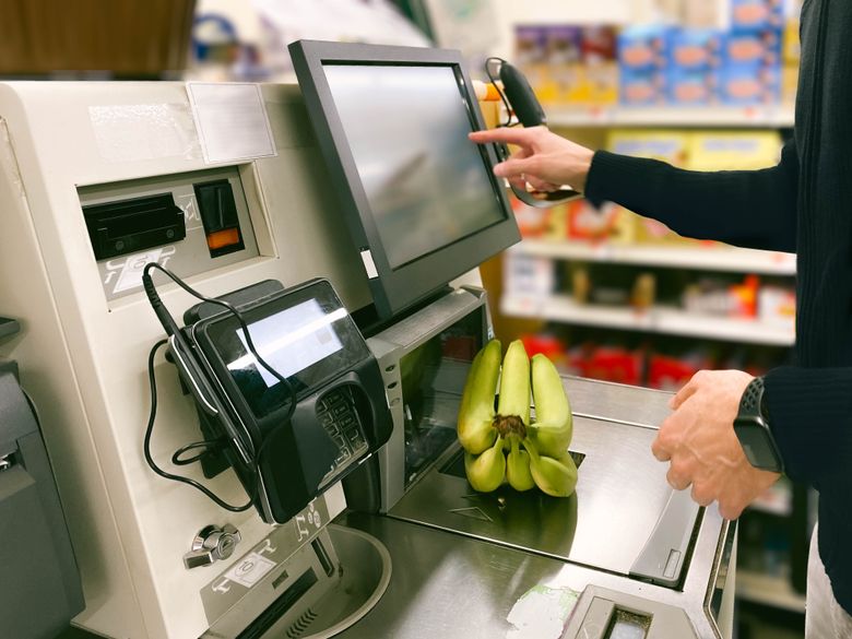 Self-service: Booths supermarket puts staff back behind its tills - BBC News