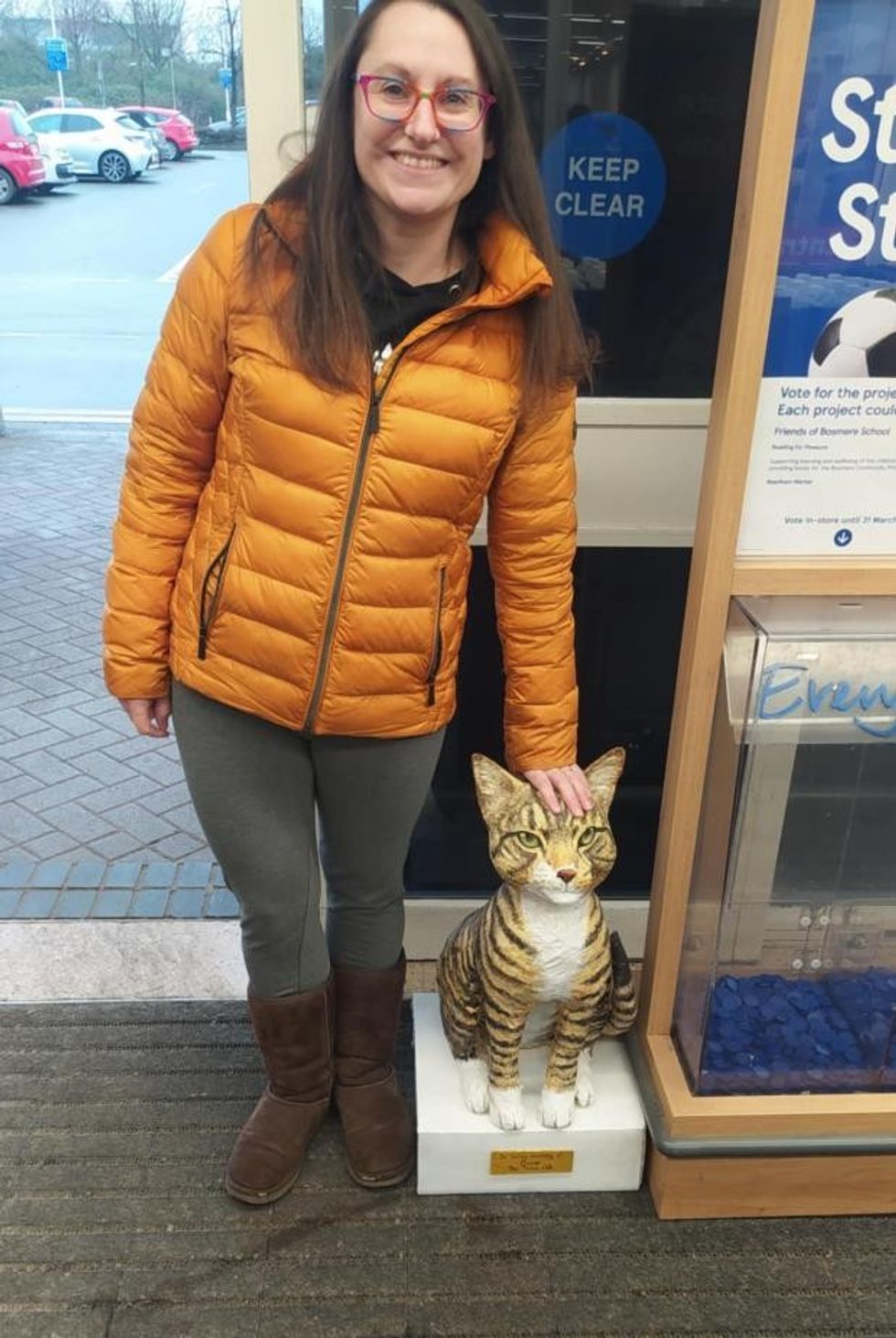 Sharon Kulesa with her sculpture of Oscar the cat