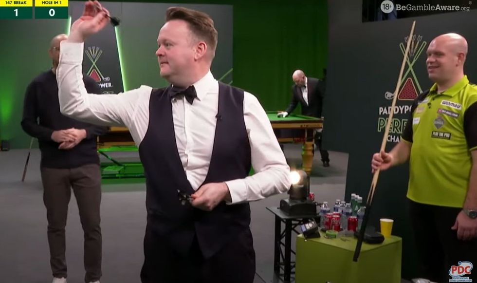 Shaun Murphy had a go with Michael van Gerwen's darts