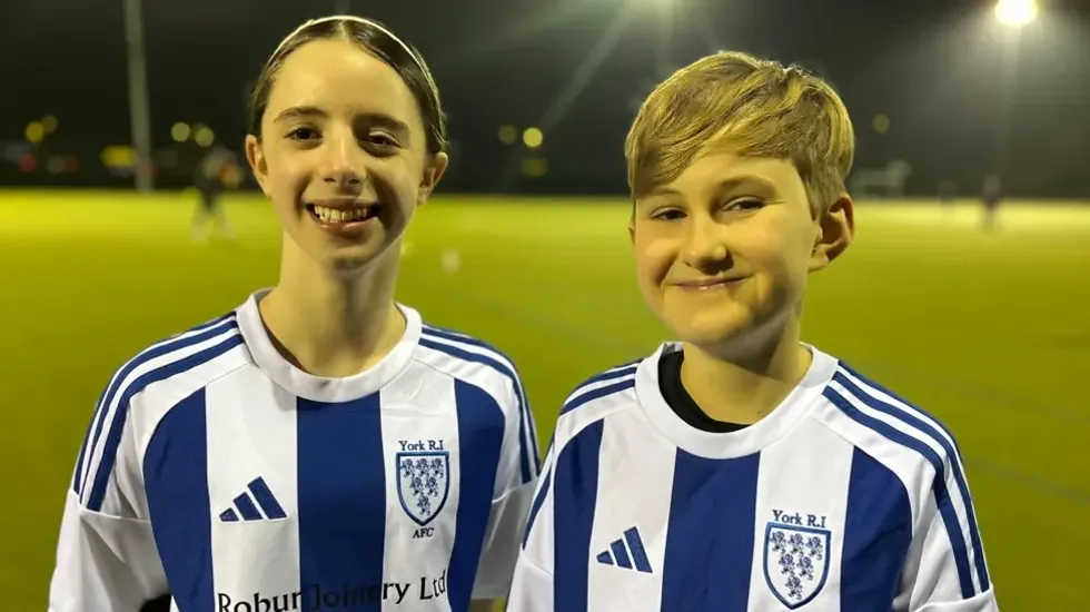 Short-haired schoolgirls at a community football club in York