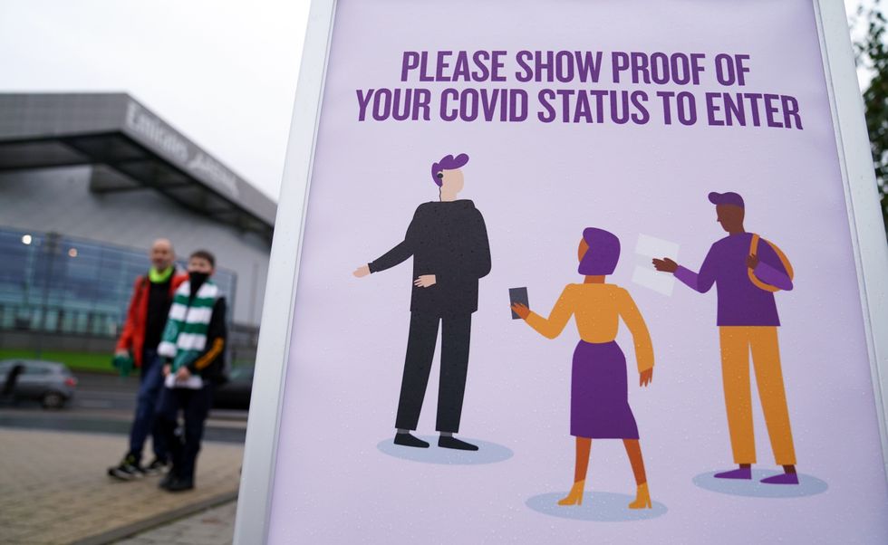 Signage informing spectators they need to show their vaccine passports to enter the ground before the UEFA Europa League Group G match at Celtic Park, Glasgow.