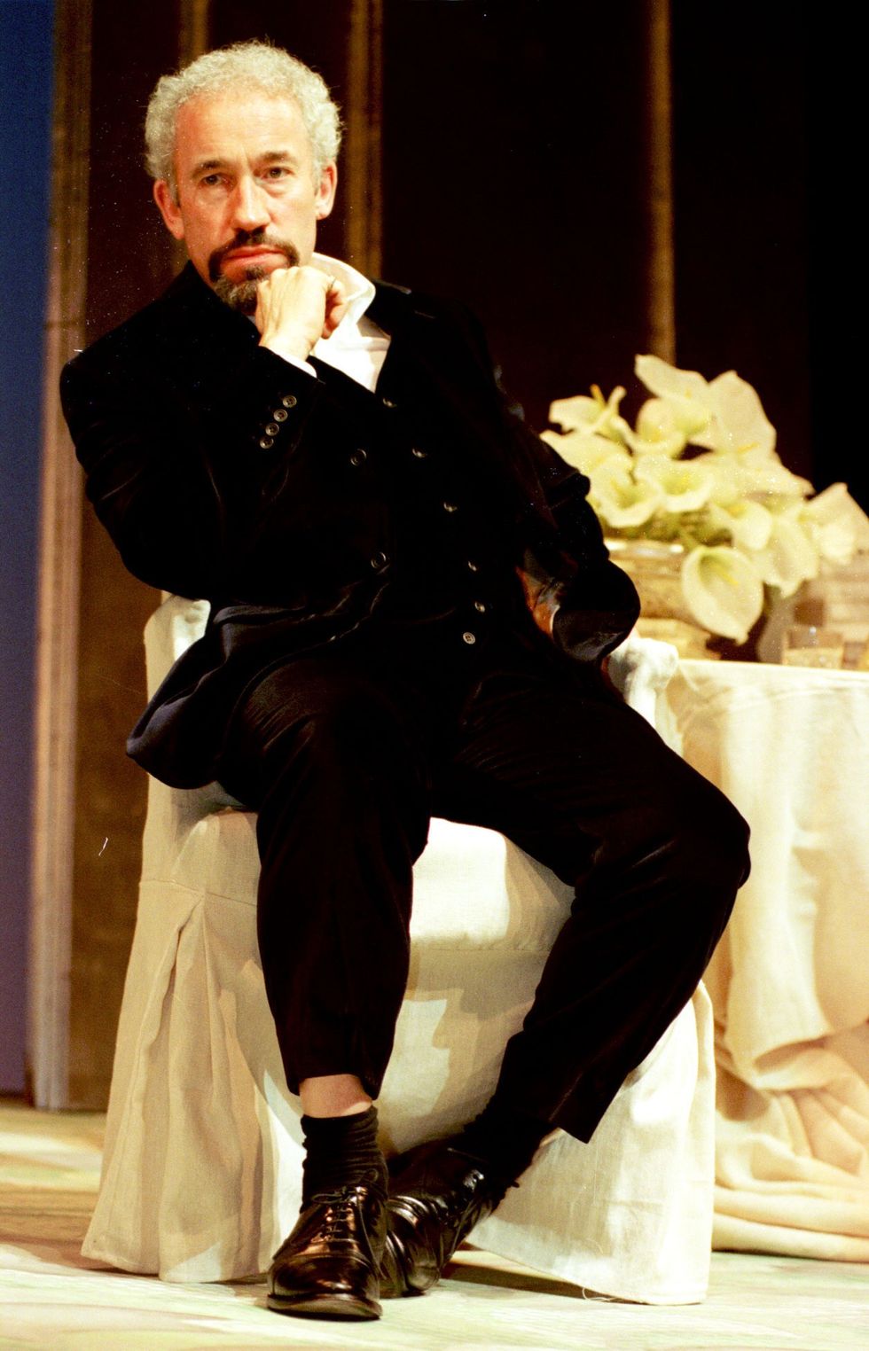 Simon Callow on stage at the Savoy Theatre playing Oscar Wilde in the play The Importance of Being Oscar Wilde\u200b