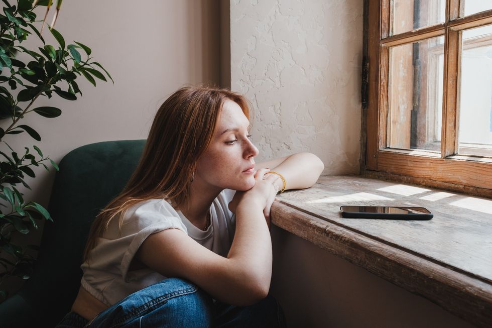 Single person looking at phone