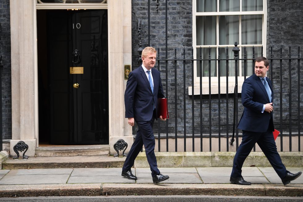 Sir Oliver Dowden and Robert Jenrick outside Downing Street