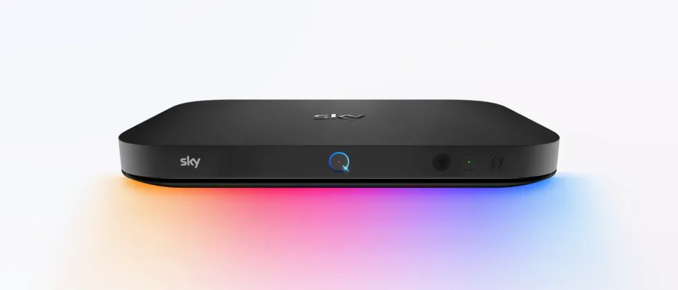 sky q set-top box pictured with q logo glowing and rainbow colours beneath it