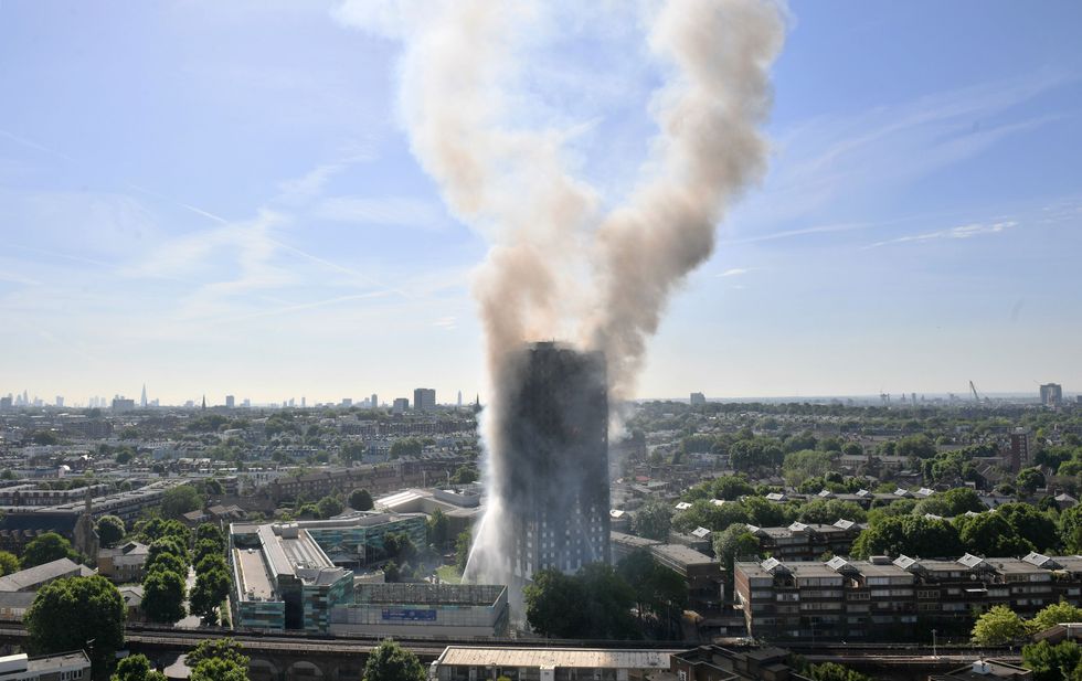 Smoke billows from a fire that has engulfed the 24-storey Grenfell Tower in west London.u200b