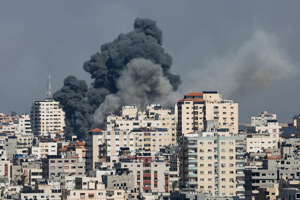 Smoke rises following Israeli strikes in Gaza, October 7