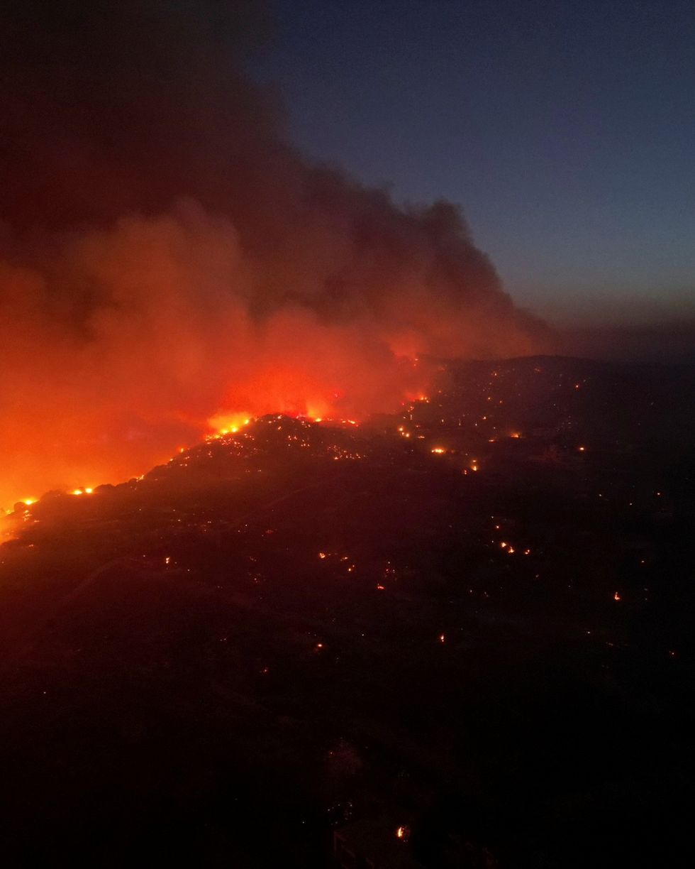 Smoke rises from a wildfire on the island of Rhodes, Greece, July 23, 2023