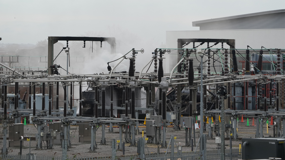 Smoke rises from the North Hyde electrical substation