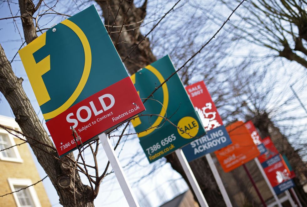 Sold signs outside UK properties