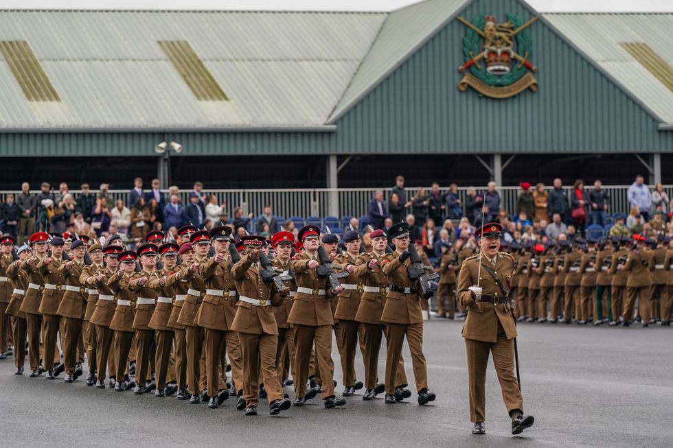 Soldiers parade on the Regimental square as they graduate from the Army Foundation College