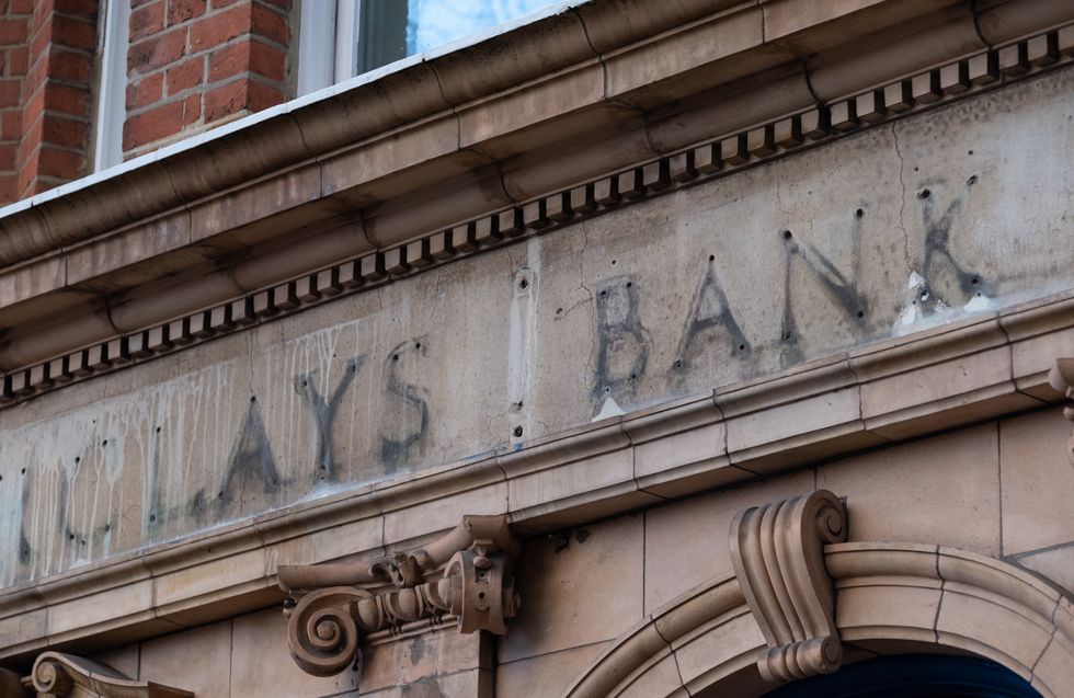 Space where Barclays bank sign used to be after branch closure