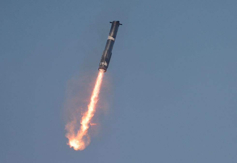 SpaceX 'Super Heavy booster' returns to its launch pad