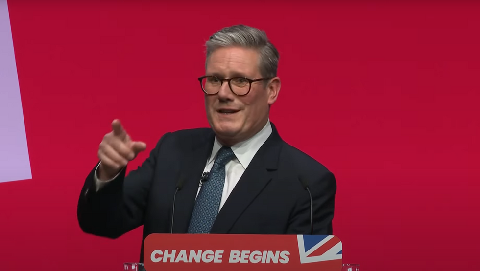 Starmer makes Corbyn jibe as pro-Palestine protester disrupts PM's speech