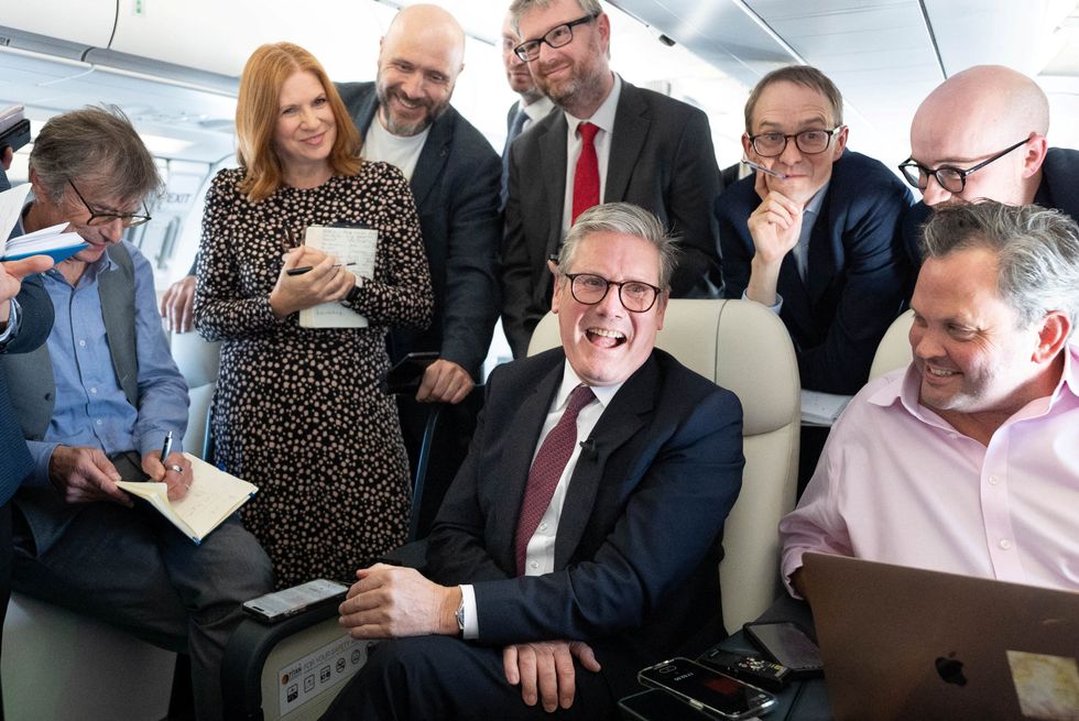 Starmer with journalists on plane to Washington DC