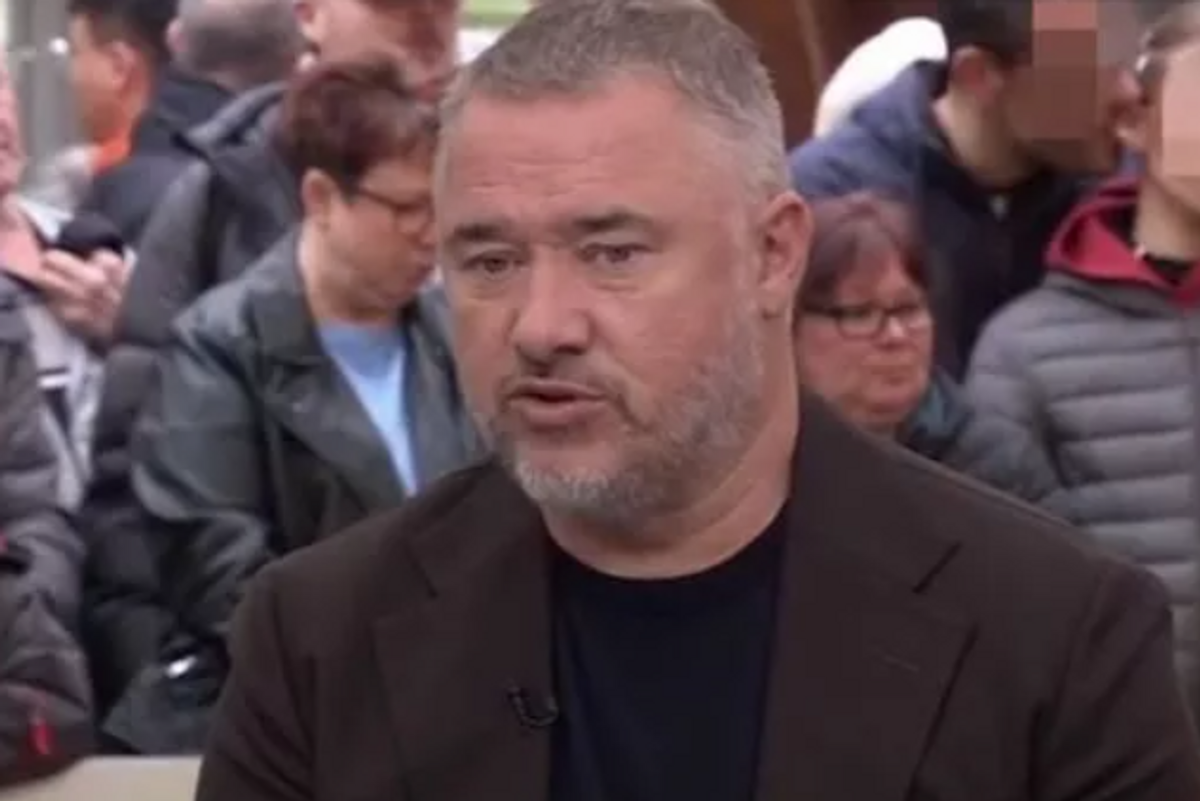 Stephen Hendry with incident in the background