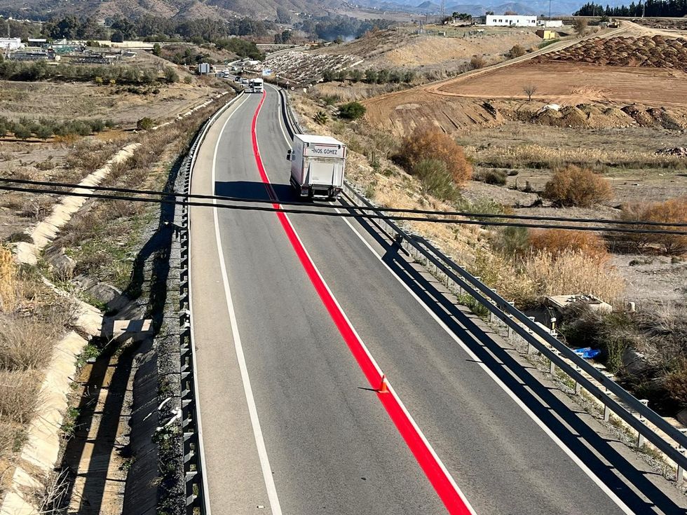 stock image car in spain and red line