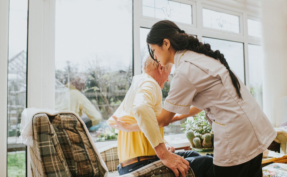 Stock image of a care home worker